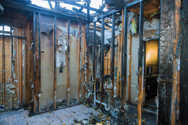 Professional Fire Damage Restoration technician working in Baldwin, WI